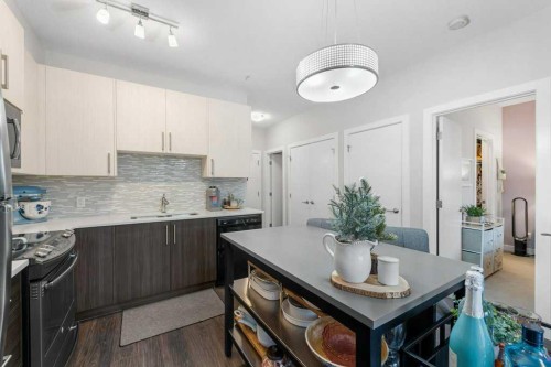 109-20 Sage Hill Terrace Nw, Calgary, AB - Indoor Photo Showing Kitchen With Upgraded Kitchen