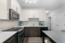 109-20 Sage Hill Terrace Nw, Calgary, AB  - Indoor Photo Showing Kitchen With Upgraded Kitchen 
