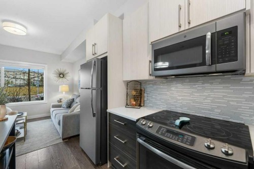 109-20 Sage Hill Terrace Nw, Calgary, AB - Indoor Photo Showing Kitchen With Stainless Steel Kitchen With Upgraded Kitchen