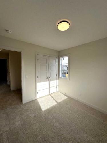 220 Waterford Heath, Chestermere, AB - Indoor Photo Showing Other Room