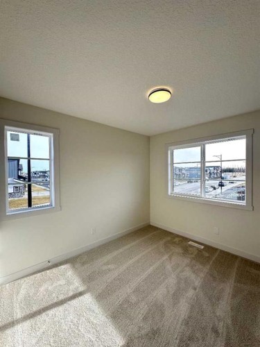 220 Waterford Heath, Chestermere, AB - Indoor Photo Showing Other Room