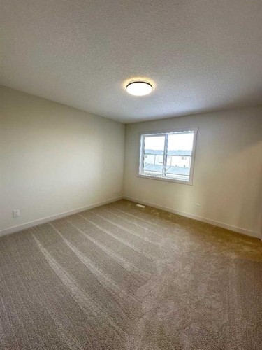 220 Waterford Heath, Chestermere, AB - Indoor Photo Showing Other Room