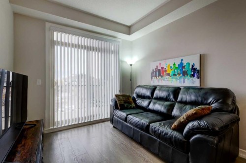 324-117 Copperpond Common Se, Calgary, AB - Indoor Photo Showing Living Room