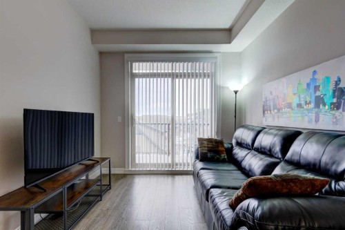 324-117 Copperpond Common Se, Calgary, AB - Indoor Photo Showing Living Room