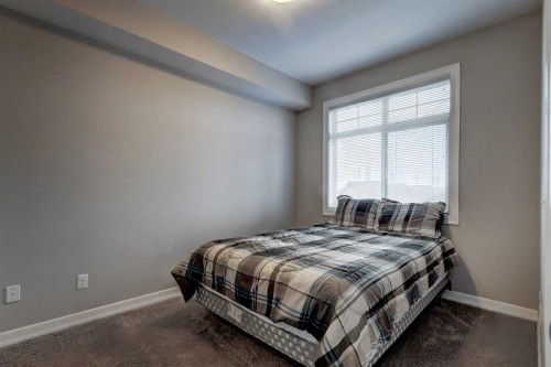 324-117 Copperpond Common Se, Calgary, AB - Indoor Photo Showing Bedroom