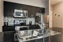 324-117 Copperpond Common Se, Calgary, AB  - Indoor Photo Showing Kitchen With Stainless Steel Kitchen With Double Sink With Upgraded Kitchen 