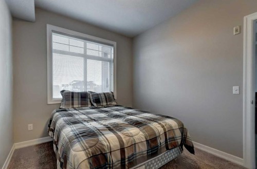 324-117 Copperpond Common Se, Calgary, AB - Indoor Photo Showing Bedroom