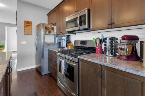 82 Fireside Cove, Cochrane, AB - Indoor Photo Showing Kitchen