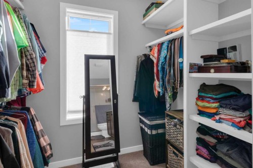 82 Fireside Cove, Cochrane, AB - Indoor With Storage