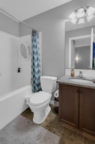 82 Fireside Cove, Cochrane, AB - Indoor Photo Showing Bathroom