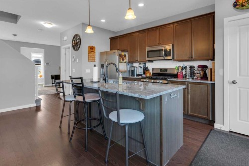 82 Fireside Cove, Cochrane, AB - Indoor Photo Showing Kitchen