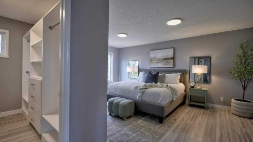 24073 Burma Road, Rural Rocky View County, AB - Indoor Photo Showing Bedroom
