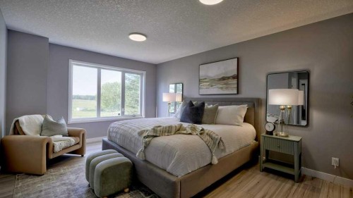 24073 Burma Road, Rural Rocky View County, AB - Indoor Photo Showing Bedroom