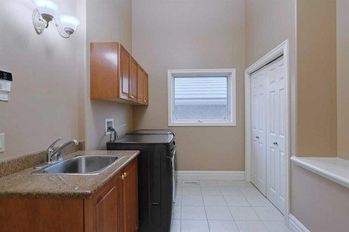 4536 Hamptons Way Nw, Calgary, AB - Indoor Photo Showing Laundry Room