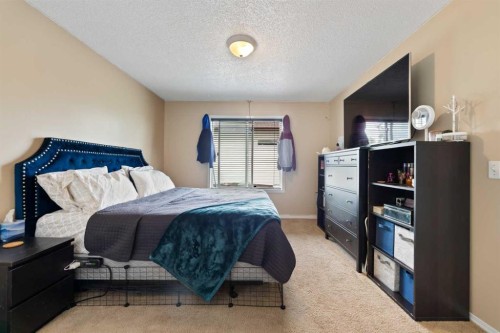 132 Mt Apex Green Se, Calgary, AB - Indoor Photo Showing Bedroom