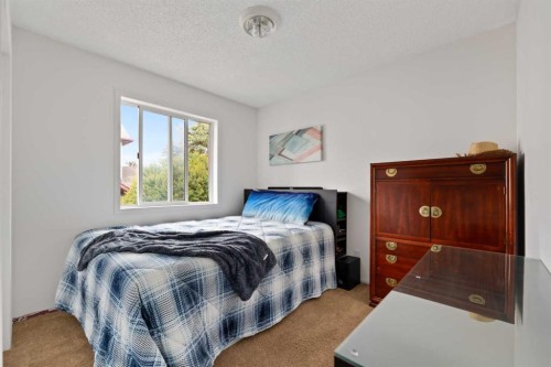 132 Mt Apex Green Se, Calgary, AB - Indoor Photo Showing Bedroom