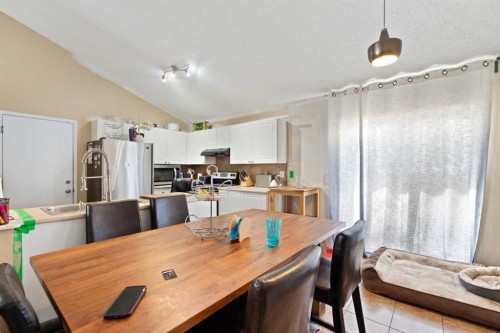 132 Mt Apex Green Se, Calgary, AB - Indoor Photo Showing Dining Room