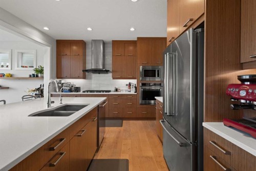 52 Evansfield Manor Nw, Calgary, AB - Indoor Photo Showing Kitchen With Double Sink With Upgraded Kitchen