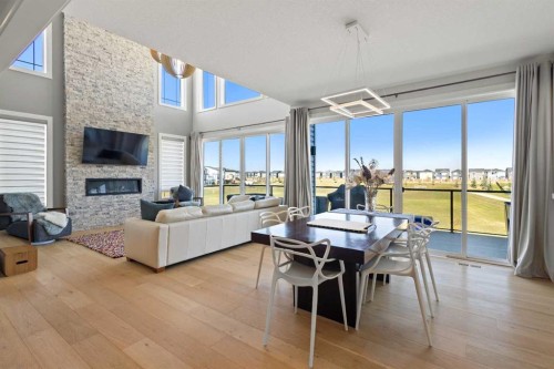 52 Evansfield Manor Nw, Calgary, AB - Indoor With Fireplace