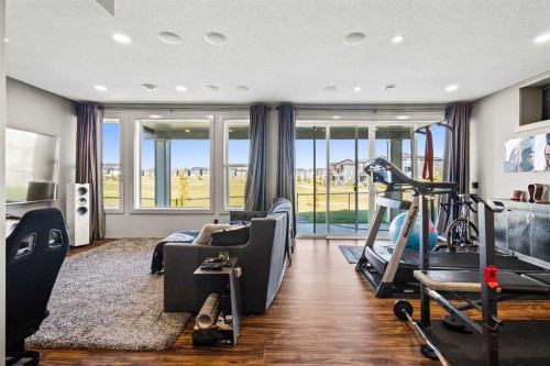 52 Evansfield Manor Nw, Calgary, AB - Indoor Photo Showing Gym Room