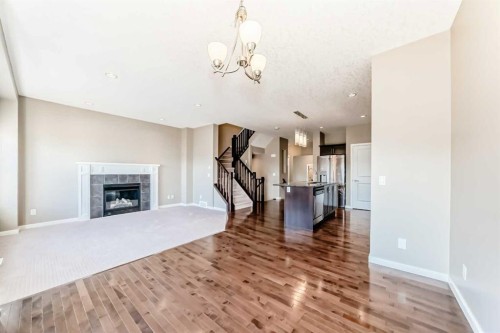 326 Kincora Glen Rise, Calgary, AB - Indoor Photo Showing Living Room With Fireplace