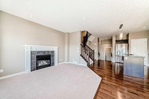 326 Kincora Glen Rise, Calgary, AB - Indoor Photo Showing Living Room With Fireplace