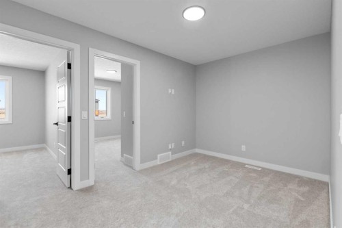 65 Amblefield Heights Nw, Calgary, AB - Indoor Photo Showing Other Room