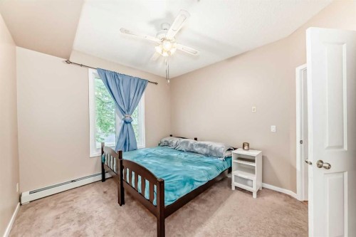 2115-1140 Taradale Drive Ne, Calgary, AB - Indoor Photo Showing Bedroom