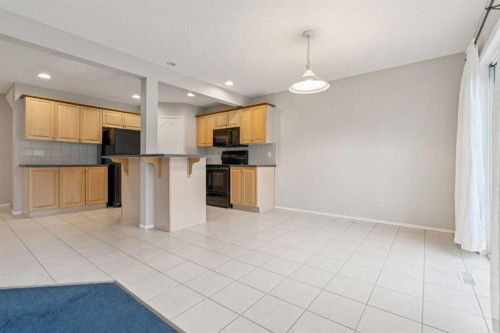 146 Everwillow Close Sw, Calgary, AB - Indoor Photo Showing Kitchen