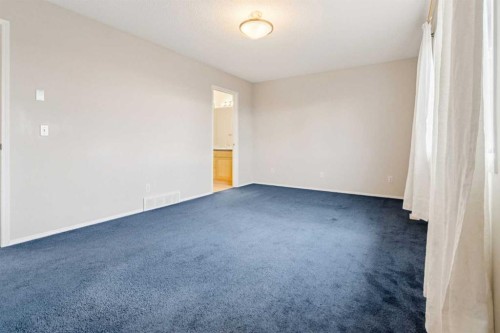 146 Everwillow Close Sw, Calgary, AB - Indoor Photo Showing Other Room
