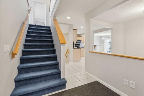 146 Everwillow Close Sw, Calgary, AB - Indoor Photo Showing Other Room