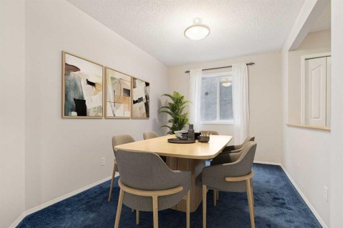 146 Everwillow Close Sw, Calgary, AB - Indoor Photo Showing Dining Room