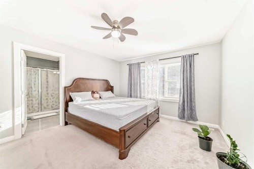 423 Redstone Drive Ne, Calgary, AB - Indoor Photo Showing Bedroom