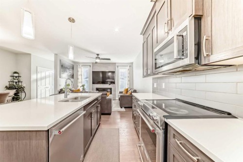 423 Redstone Drive Ne, Calgary, AB - Indoor Photo Showing Kitchen With Double Sink