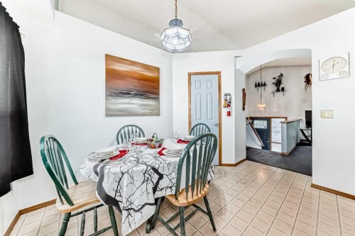 128 Erin Meadow Way Se, Calgary, AB - Indoor Photo Showing Dining Room