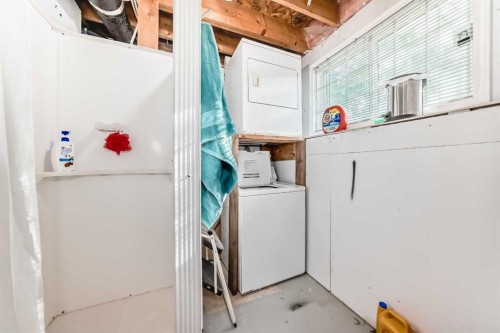 128 Erin Meadow Way Se, Calgary, AB - Indoor Photo Showing Laundry Room