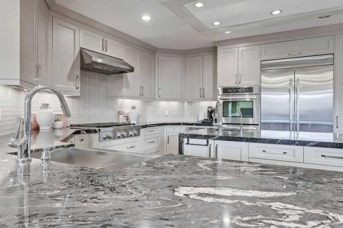 32 Aspen Ridge Manor Sw, Calgary, AB - Indoor Photo Showing Kitchen With Upgraded Kitchen