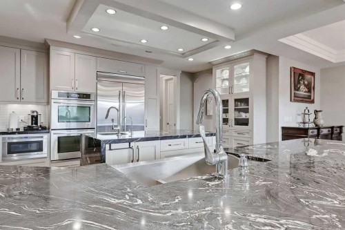 32 Aspen Ridge Manor Sw, Calgary, AB - Indoor Photo Showing Kitchen With Upgraded Kitchen