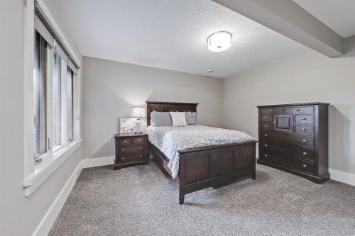 32 Aspen Ridge Manor Sw, Calgary, AB - Indoor Photo Showing Bedroom