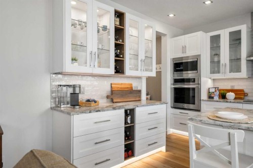 808 Coopers Square Sw, Airdrie, AB - Indoor Photo Showing Kitchen With Upgraded Kitchen