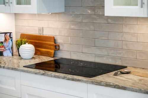 808 Coopers Square Sw, Airdrie, AB - Indoor Photo Showing Kitchen