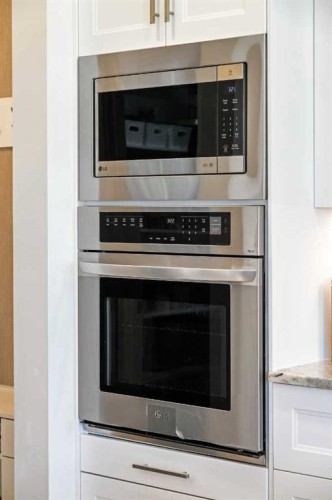 808 Coopers Square Sw, Airdrie, AB - Indoor Photo Showing Kitchen