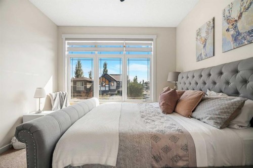 808 Coopers Square Sw, Airdrie, AB - Indoor Photo Showing Bedroom