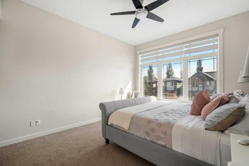 808 Coopers Square Sw, Airdrie, AB - Indoor Photo Showing Bedroom
