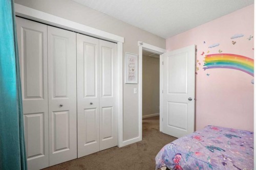 808 Coopers Square Sw, Airdrie, AB - Indoor Photo Showing Bedroom