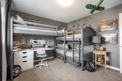 808 Coopers Square Sw, Airdrie, AB - Indoor Photo Showing Bedroom