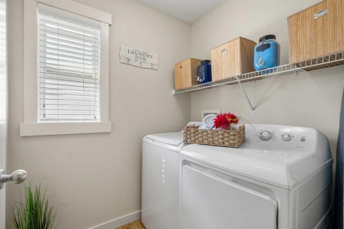 808 Coopers Square Sw, Airdrie, AB - Indoor Photo Showing Laundry Room