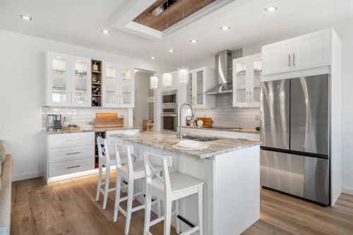 808 Coopers Square Sw, Airdrie, AB - Indoor Photo Showing Kitchen With Upgraded Kitchen