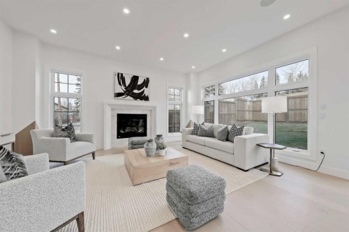 4840 22 Avenue Nw, Calgary, AB - Indoor Photo Showing Living Room With Fireplace