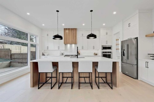 4840 22 Avenue Nw, Calgary, AB - Indoor Photo Showing Kitchen With Stainless Steel Kitchen With Upgraded Kitchen
